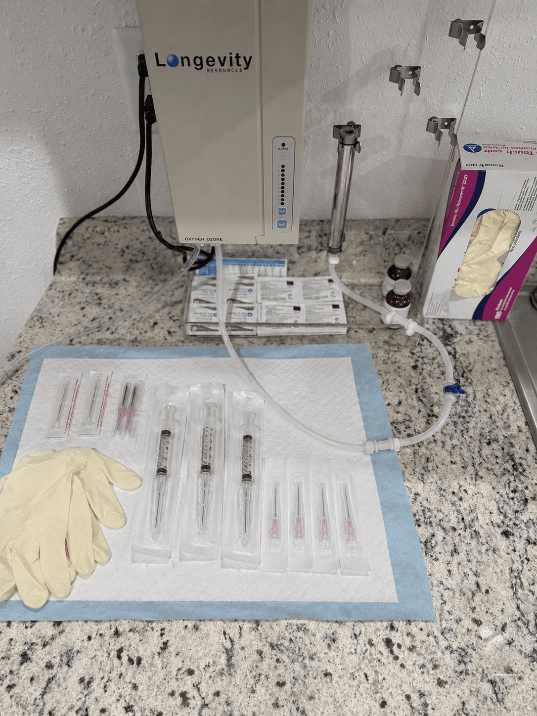 Ozone generator with a sterile drape and prepared clinical supplies at Relief Plus